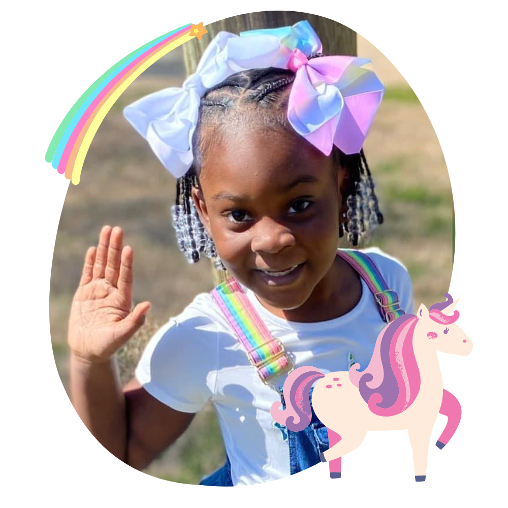 little black girl with braided pigtails and double bows in her hair with beads